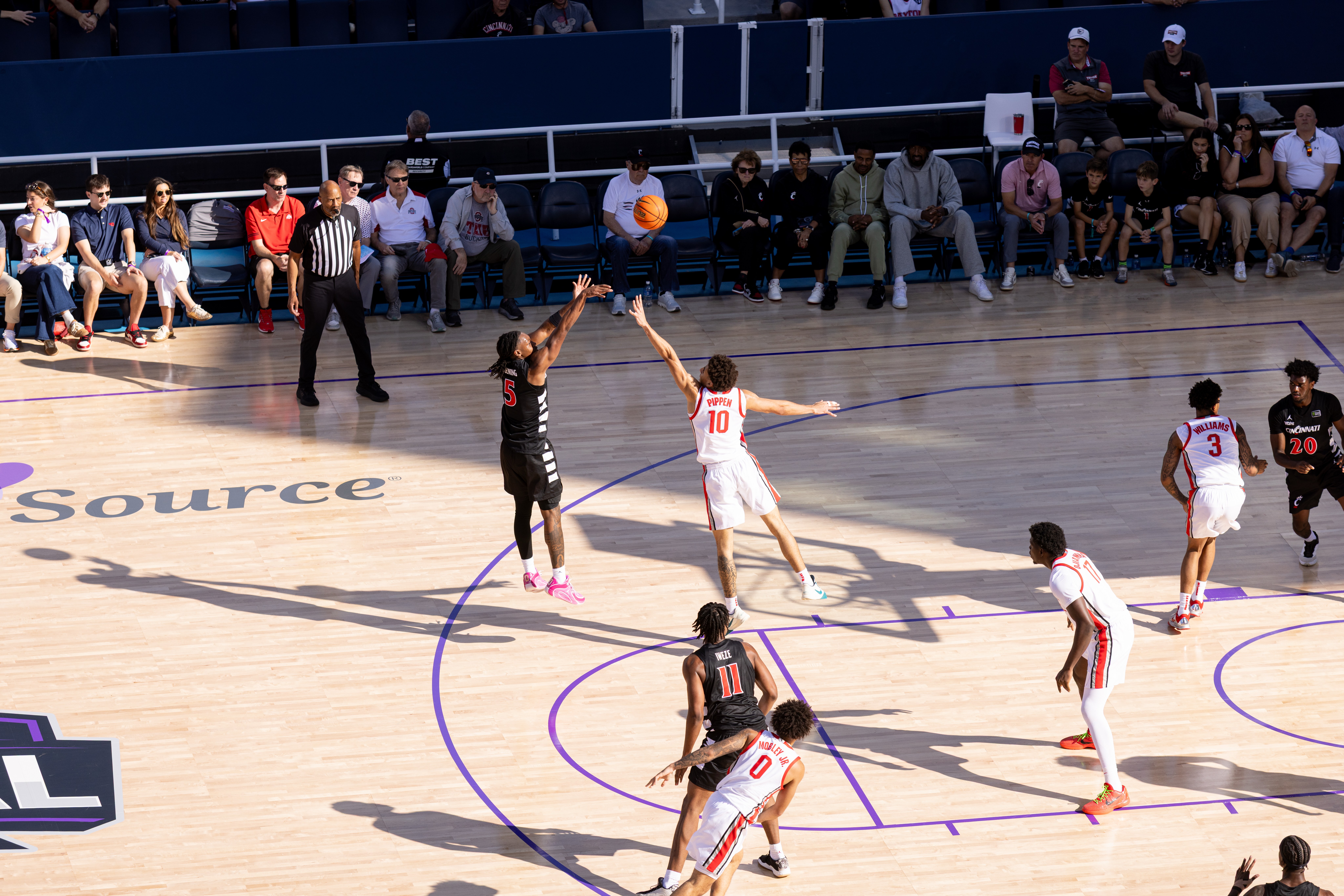 Akai Fleming attempts a three-point shot during Cincinnati's Oct. 7 exhibition match against Ohio State