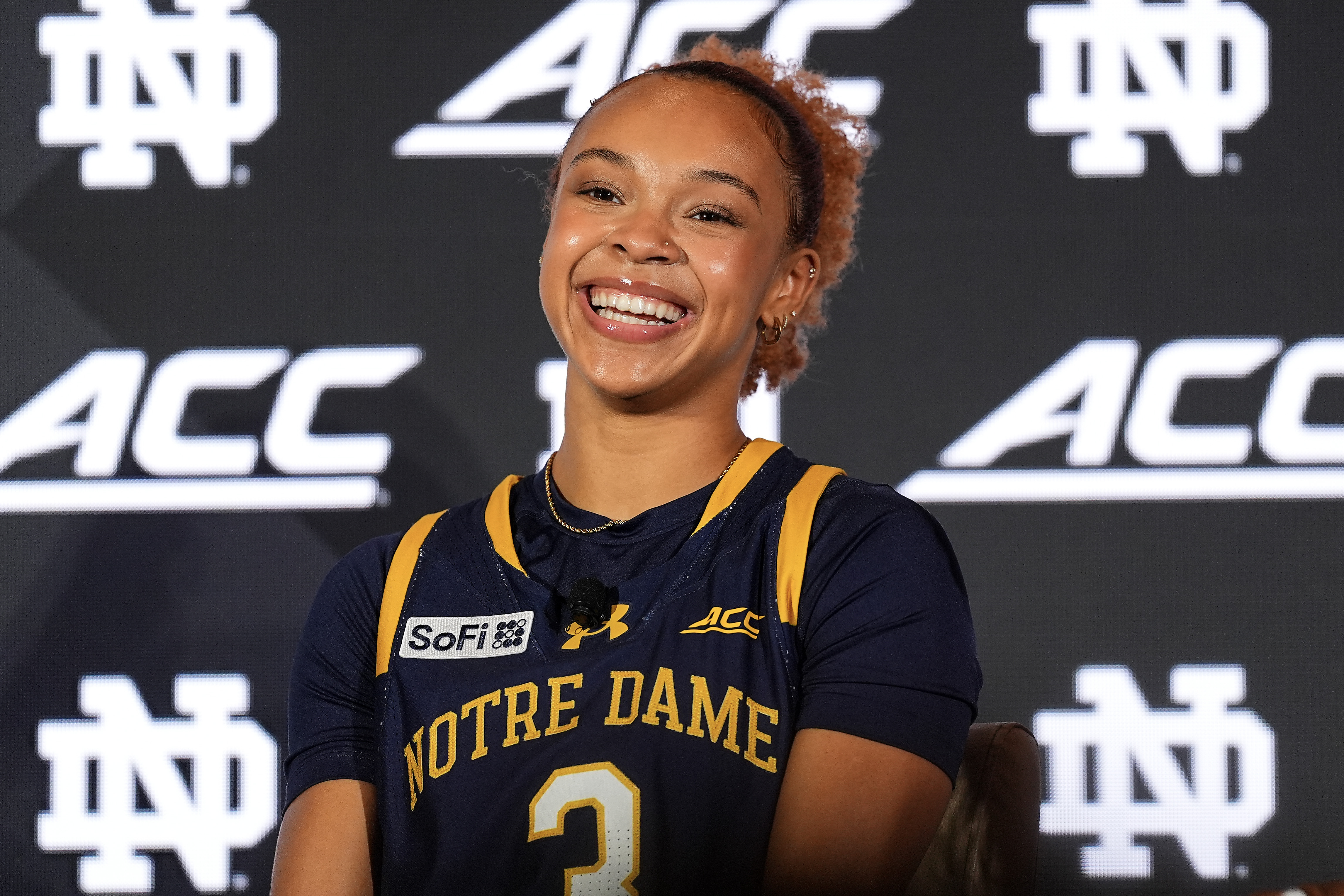 Notre Dame's Hannah Hidalgo flashing a smile while fielding questions at the 2026 ACC media day