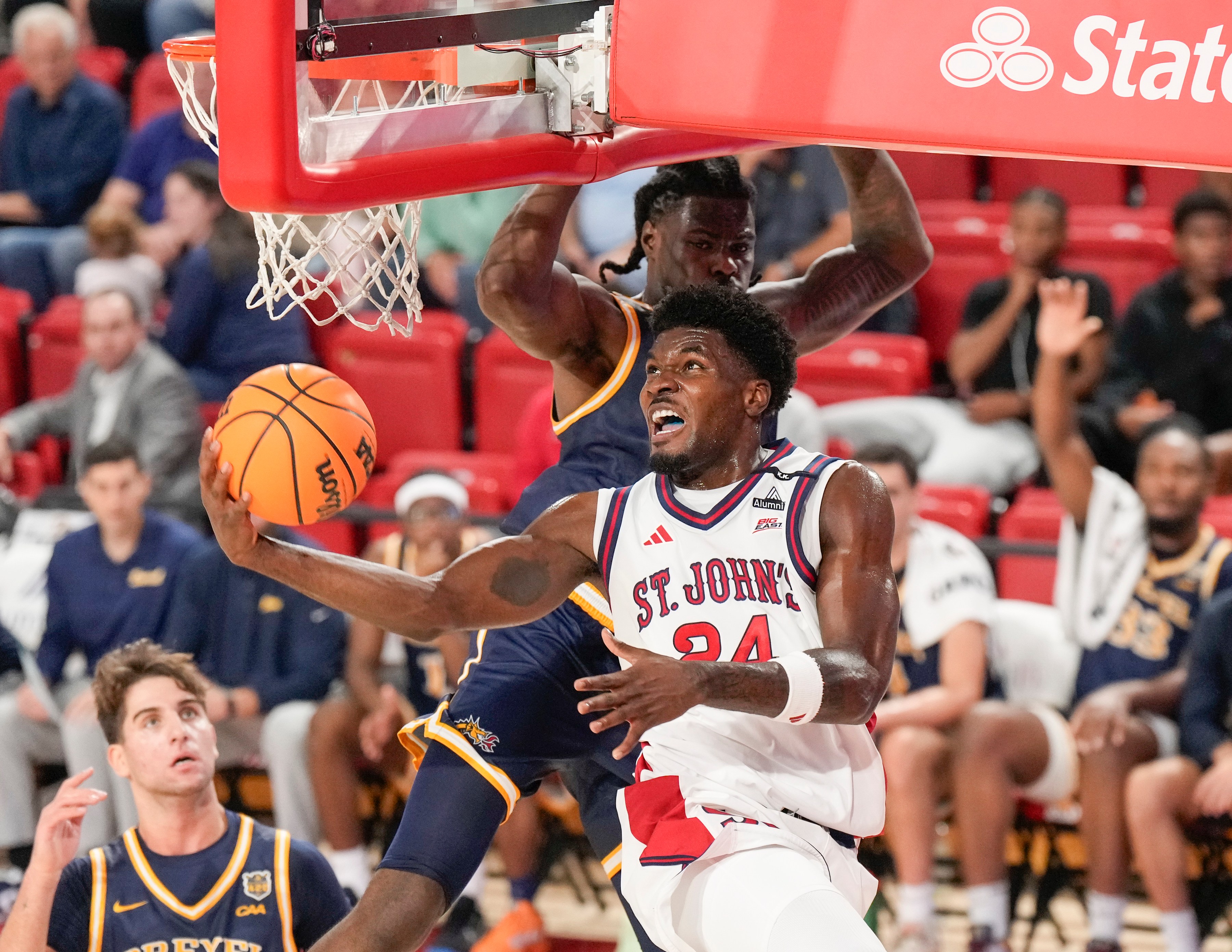St. John's guard Tounde Yessoufou attempts a reverse layup against Drexel